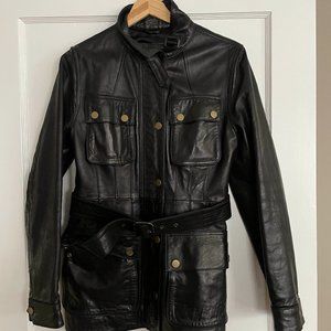 Leather moto-jacket. Brass buckle detail